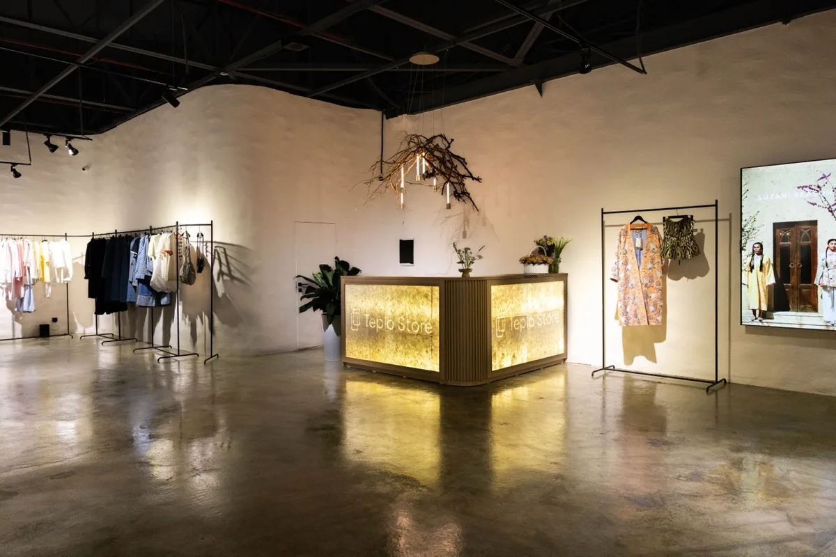 Counter corner with branch chandelier and Suzani artwork