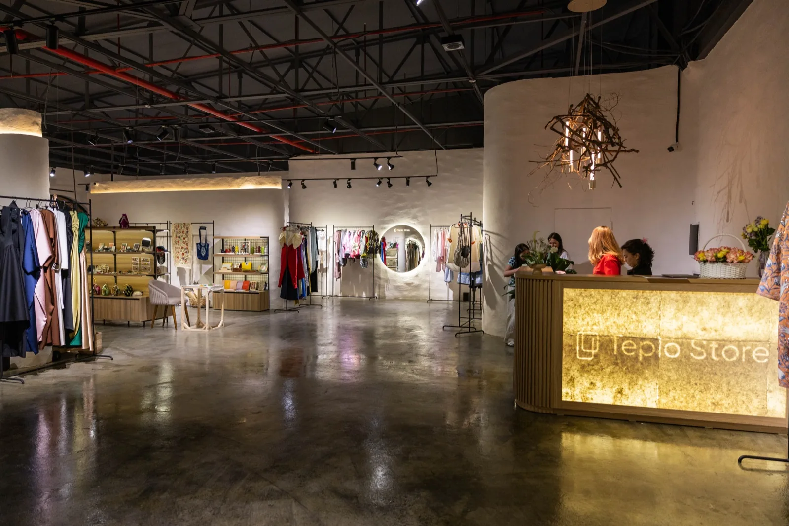 Samarkand flagship — the illuminated Teplo Store counter